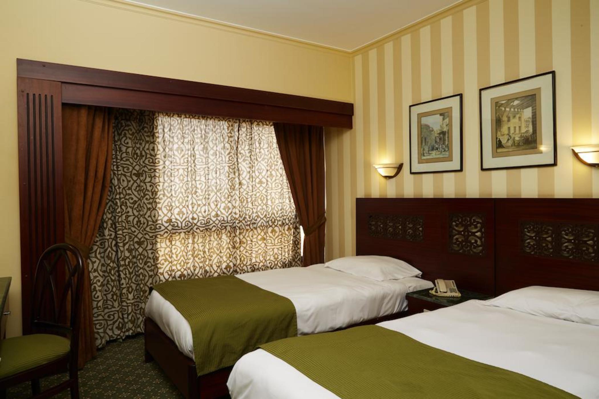 Pyramisa Suites Hotel Cairo Giza Bagian luar foto A room at the hotel